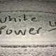 One of the “white power” messages seen marked in snow on a car on Calvin College’s campus in Michigan
Facebook